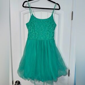 Gently worn homecoming dress. Size 9, but very flexible material.